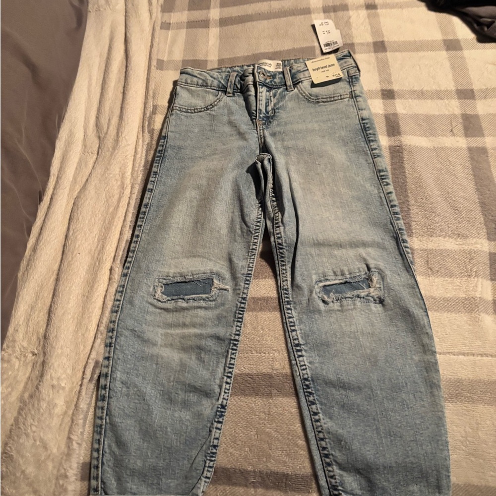 Girls jeans. Never worn. New with tags. Smoke and bug free